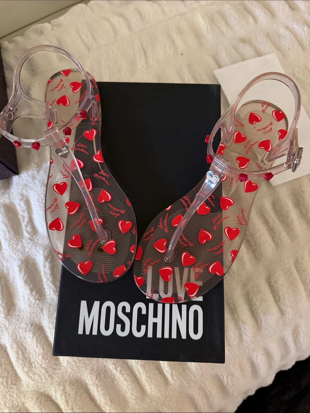 Moschino Clear Jelly Sandals with Red Heart Embellishments
